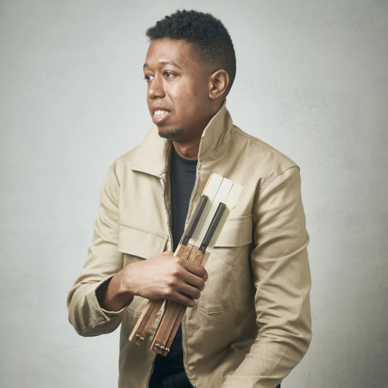 Lawrence Fields portrait in a tan jacket